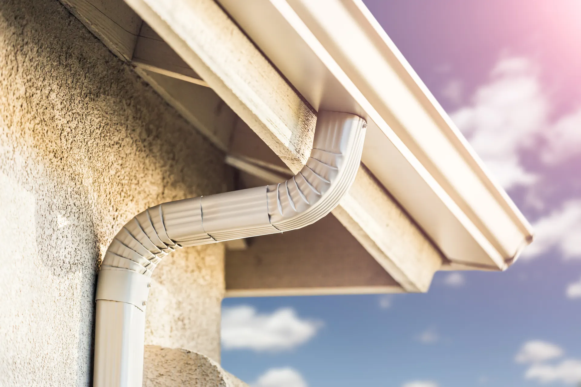 New seamless aluminum gutters on a home